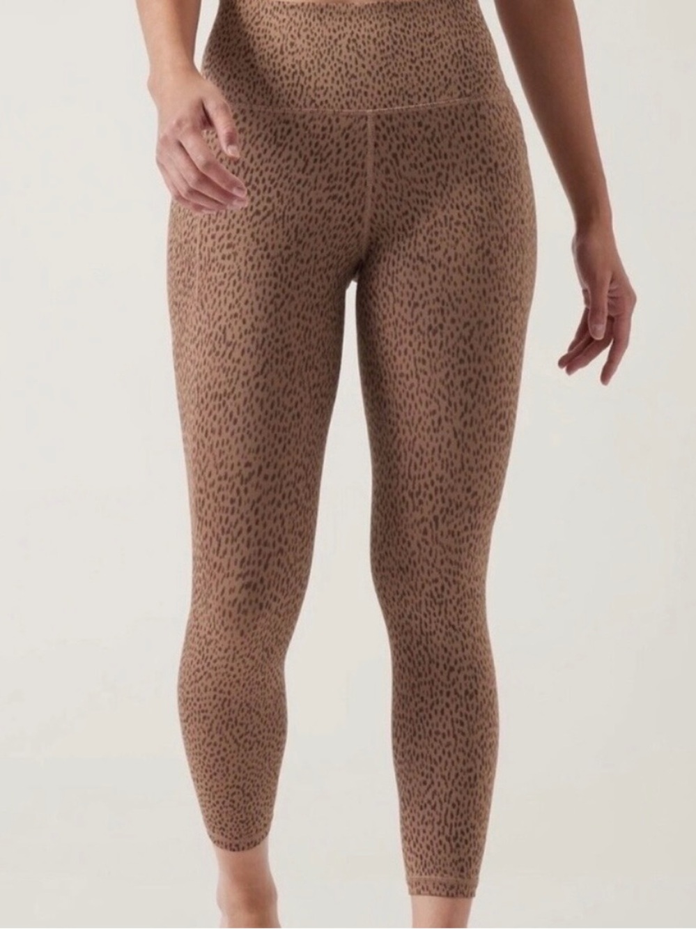Athleta salutation stash 7/8 tight animal print size M